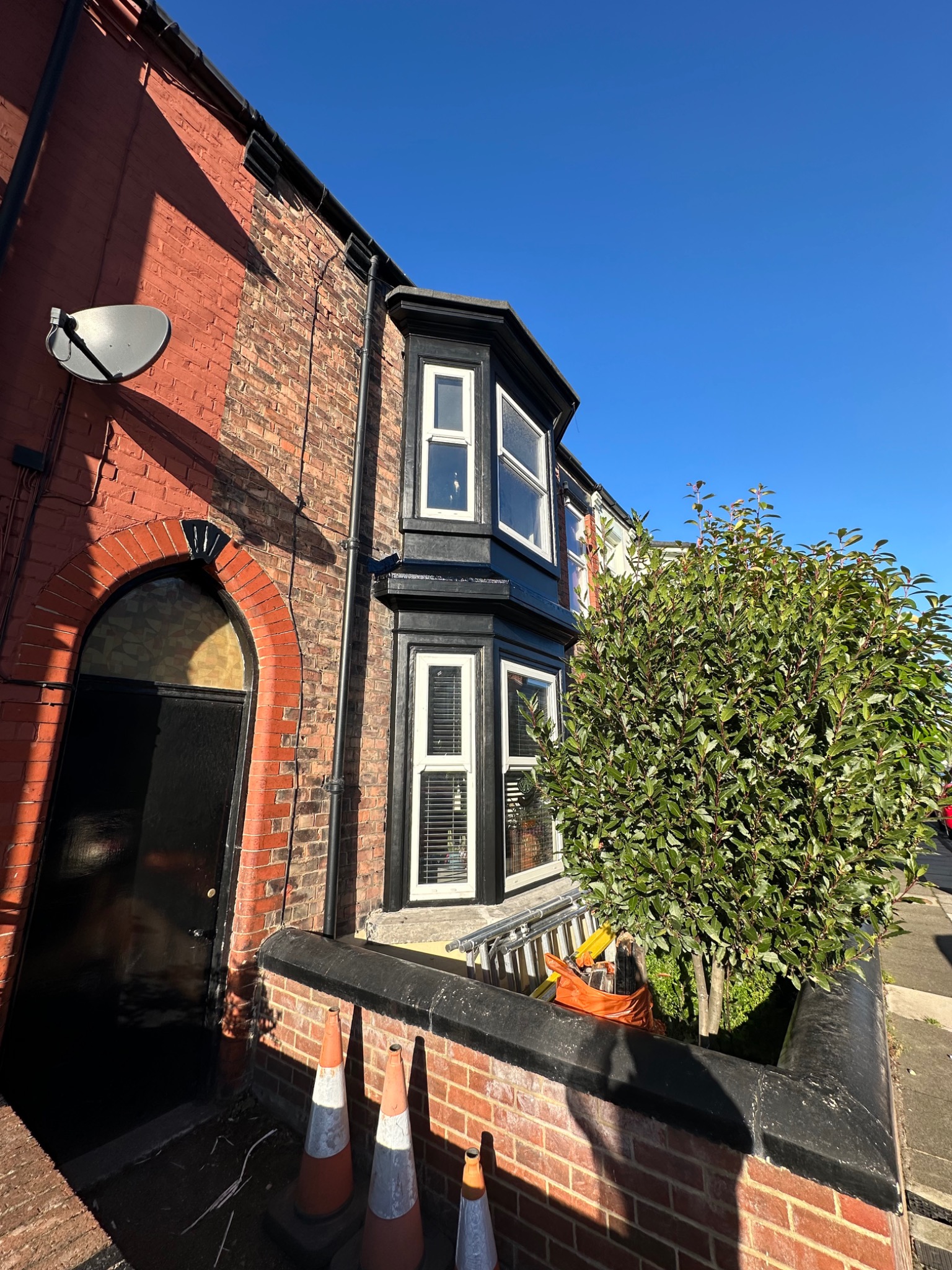 Full view of completed Victorian double bay window restoration